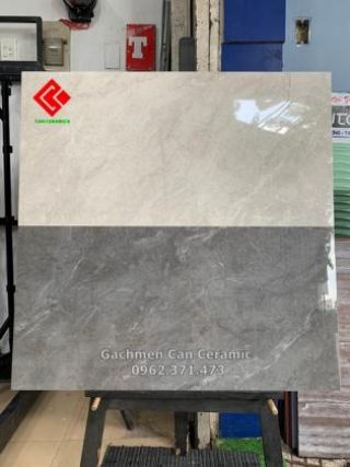 Gạch 40x80 bóng kiếng vân đá ốp tường phòng khách màu xám