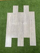 Gạch vân gỗ 15x90 lát phòng ngủ màu xám AT104