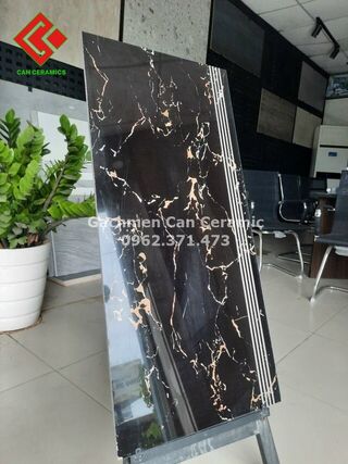 Gạch 47x100 đen vân cam ốp tam cấp